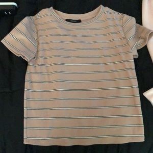 pink black and white striped shirt